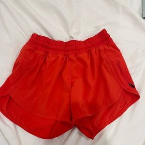 coral size 4 lulu shorts 4 inch